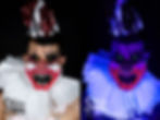 An EDC client wearing uv/glow body paint side-by-side with regular light and UV light