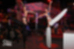 Skin City event performers on stilts at a corporate party