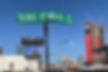 A street sign marker for Debbie Reynolds Drive overlooking the Las Vegas strip